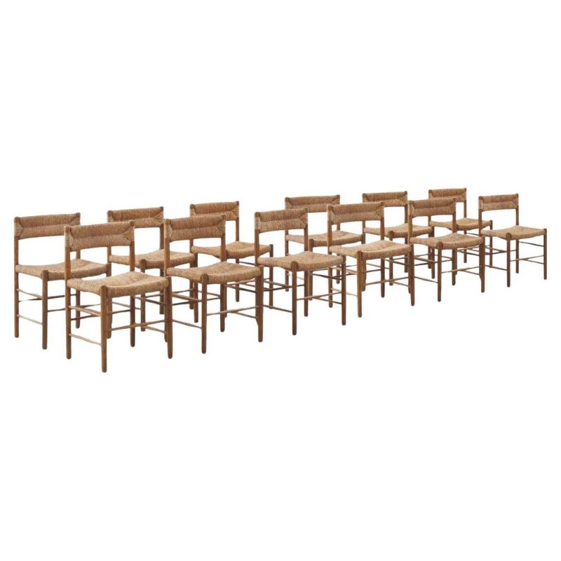 Set of Twelve Charlotte Perriand Dordogne Chairs for Robert Sentou, France c1950